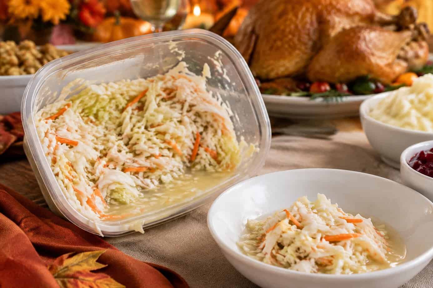 Store-bought coleslaw in a plastic tub