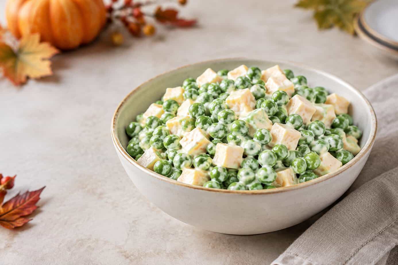 Pea salad with cheese cubes